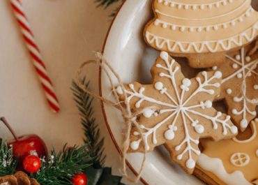christmas cookies on white ceramic bowl