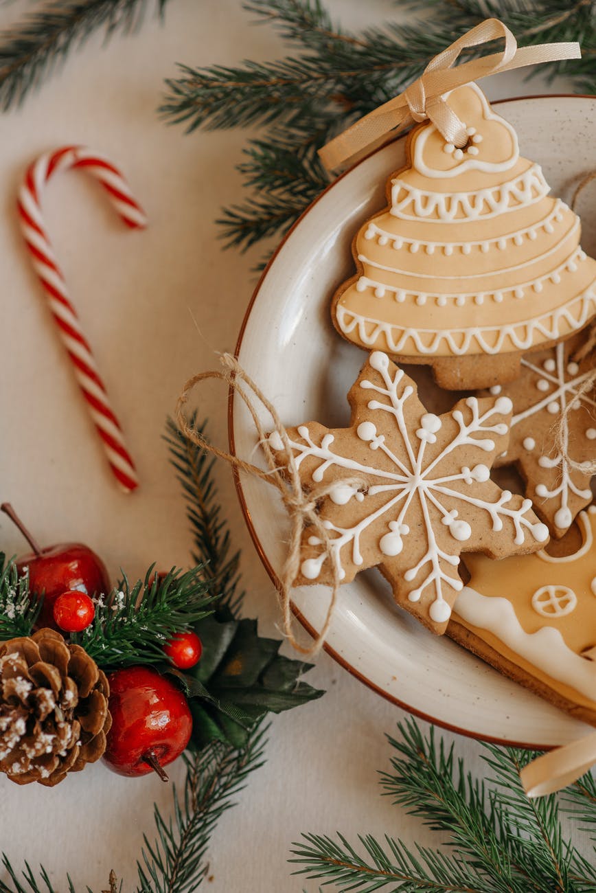 christmas cookies on white ceramic bowl